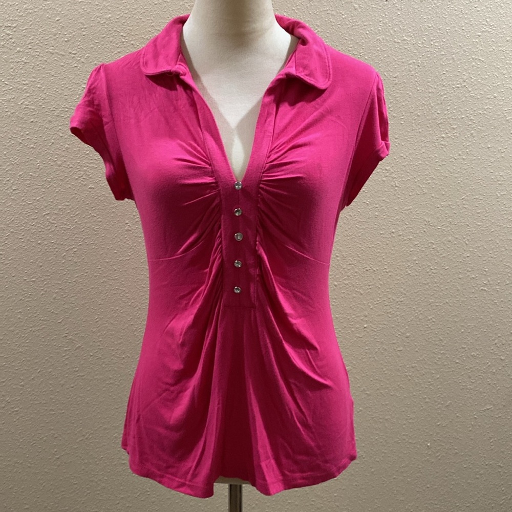 Hot pink V neck blouse made of very soft cotton. With rhinestone buttons
